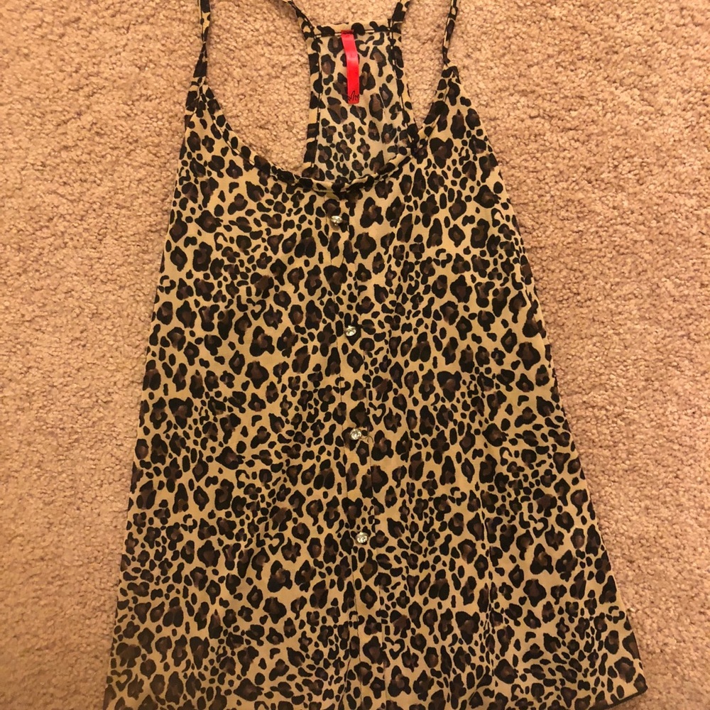 Two cheetah tops size large